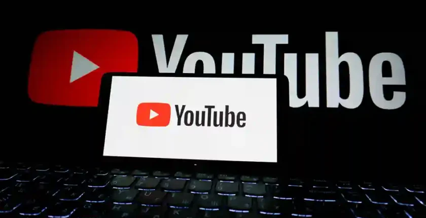 Laptop displaying the YouTube logo representing YouTube automation and online income opportunities